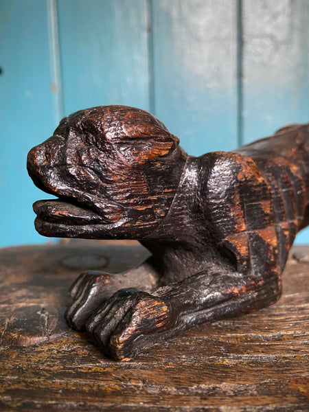 Pair Charming Antique 17th Century Oak Hounds In Recumbent Poses With Naive Grimacing Faces