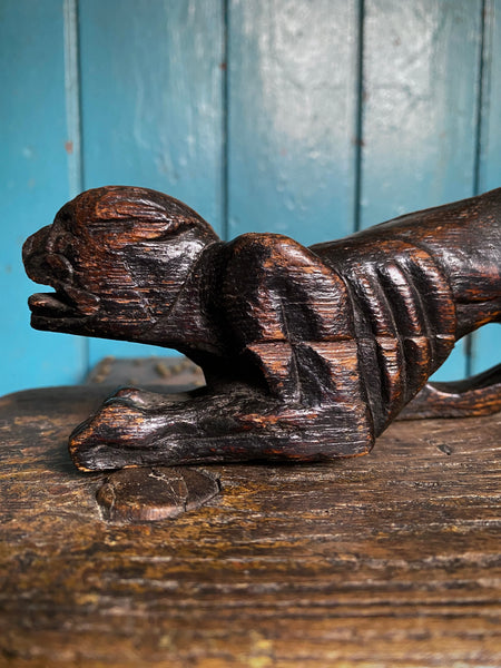 Pair Charming Antique 17th Century Oak Hounds In Recumbent Poses With Naive Grimacing Faces