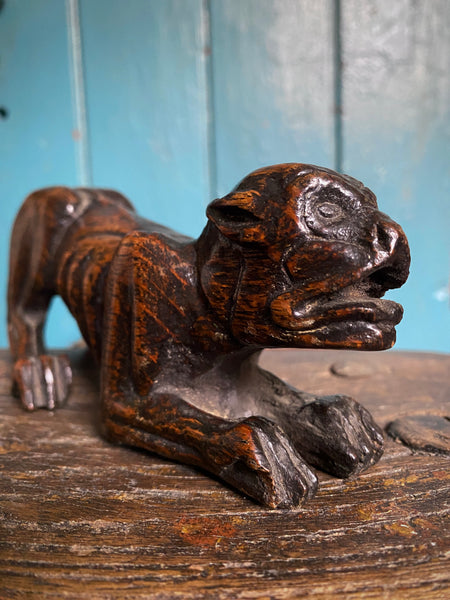 Pair Charming Antique 17th Century Oak Hounds In Recumbent Poses With Naive Grimacing Faces