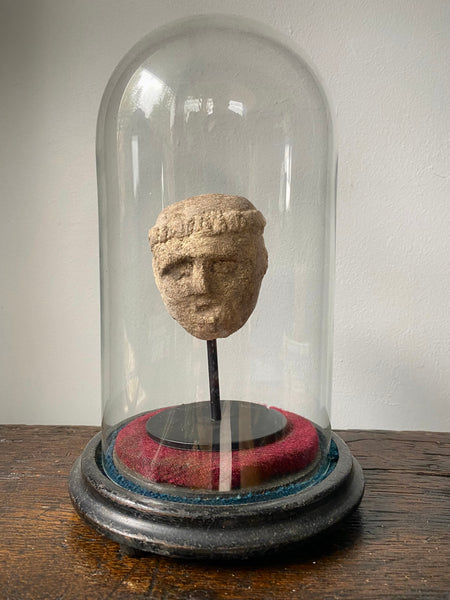 A Curious Antique Carved Stone Monk’s Head On Modern Stand Housed Within A 19th Century Glass Display Dome