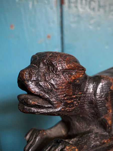 Pair Charming Antique 17th Century Oak Hounds In Recumbent Poses With Naive Grimacing Faces